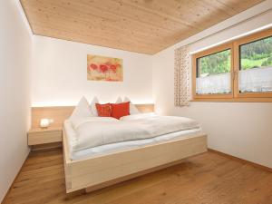 Postel nebo postele na pokoji v ubytování Felder Apartments
