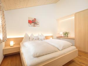 Postel nebo postele na pokoji v ubytování Felder Apartments