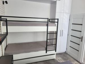 A bed or beds in a room at Apartmán Pekná Vyhliadka - Vila Vlasta