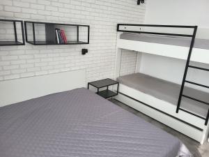 A bed or beds in a room at Apartmán Pekná Vyhliadka - Vila Vlasta