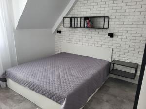 A bed or beds in a room at Apartmán Pekná Vyhliadka - Vila Vlasta