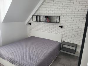 A bed or beds in a room at Apartmán Pekná Vyhliadka - Vila Vlasta