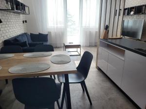A kitchen or kitchenette at Apartmán Pekná Vyhliadka - Vila Vlasta