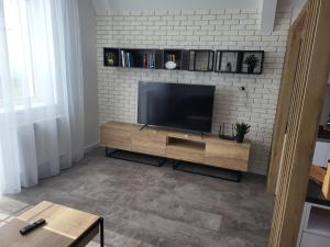 A television and/or entertainment centre at Apartmán Pekná Vyhliadka - Vila Vlasta