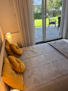 Łóżko lub łóżka w pokoju w obiekcie Apartament Stella Baltic