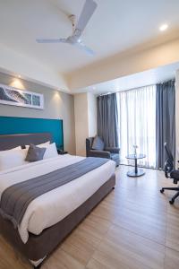 Postel nebo postele na pokoji v ubytování REPUBLIC INN