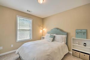 a bedroom with a bed and a window at Lovely East Point Home Less Than 8 Mi to Downtown ATL in Atlanta