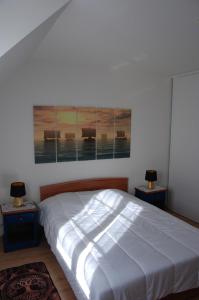 Postel nebo postele na pokoji v ubytování La salicorne