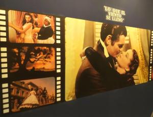 a book with three pictures of a couple at Hotel Paula Films Collection in Mérida +41 photos