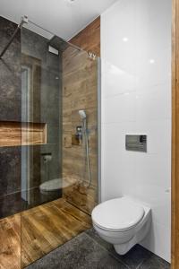 Kúpeľňa v ubytovaní REZYDENCJA SKIBÓWKI sauna&jacuzzi