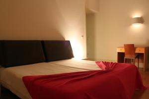 Cama ou camas em um quarto em HI Guimaraes - Pousada de Juventude