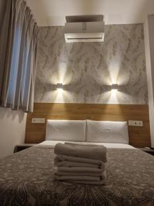Cama o camas de una habitación en Hostal Esparteros