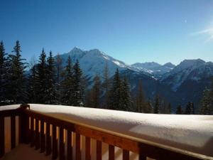 a snow covered balcony with a view of a mountain at Appartement Montvalezan-La Rosière, 2 pièces, 4 personnes - FR-1-398-520 in La Rosière