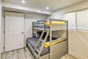a small room with bunk beds in it at West Valley City Duplex about 13 Mi to Downtown SLC! in West Valley City