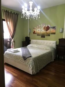 A bed or beds in a room at Casa Di Marzio