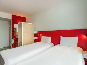 Katil atau katil-katil dalam bilik di ibis Styles Karlsruhe Ettlingen +37 gambar