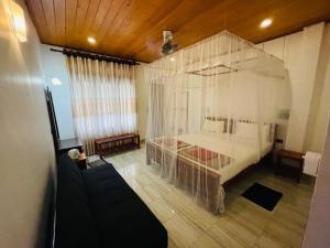 Postel nebo postele na pokoji v ubytování Jade Green Rest Inn