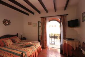 Posteľ alebo postele v izbe v ubytovaní Petit Hotel Ses Rotges - Only Adults