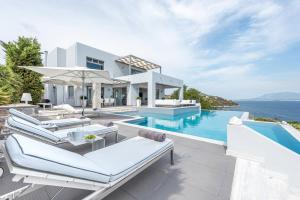 an image of a villa with a swimming pool at Villa Soligia Blue in Pefkali