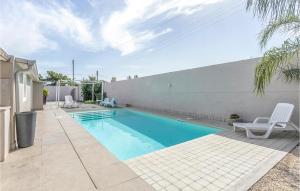 Bazén v ubytování Nice Home In Santa Croce Camerina nebo v jeho okolí + 26 fotografií