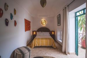 Postel nebo postele na pokoji v ubytování Riad Villa Berna under Swiss Management + 37 fotografií