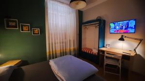 Postel nebo postele na pokoji v ubytování Civico 4