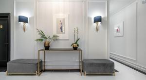 a living room with two stools and a table at Praxitelous Luxury Suites in Athens +64 photos