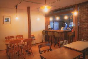 Εστιατόριο ή άλλο μέρος για φαγητό στο ゲストハウス＆カフェバー　エストアール +7 φωτογραφίες
