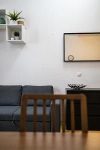 Posezení v ubytování Cosy 1 Bedroom Apartment in Gozsdu Court
