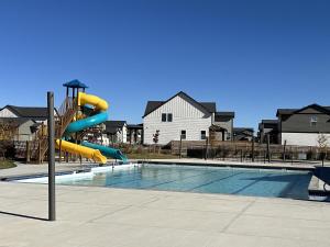 The swimming pool at or close to Modern Farmhouse Townhome - Great Central Location