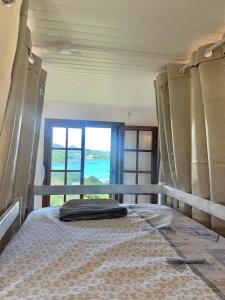 Postel nebo postele na pokoji v ubytování Top Hill Hostel- Martinique- auberge dortoir