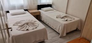 Postel nebo postele na pokoji v ubytování Nature Hotel Doğa Hotel Ölüdeniz