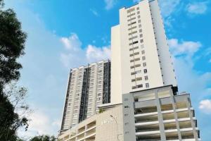 a tall white building in front of a blue sky at New Condo SYMPHONY II in Kajang , Semenyih in Semenyih