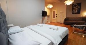 Posteľ alebo postele v izbe v ubytovaní Athens City Themis13 + 10 fotografií