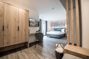 Postel nebo postele na pokoji v ubytování Hotel Walter