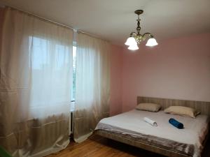 Postel nebo postele na pokoji v ubytování Krone Hostel