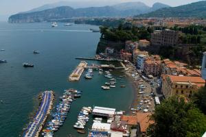 an aerial view of a harbor with boats in the water at Coltur Suites in Sorrento