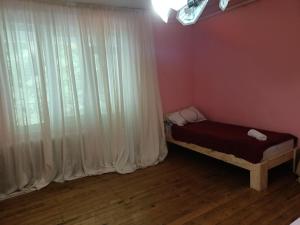 Postel nebo postele na pokoji v ubytování Krone Hostel