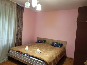 Postel nebo postele na pokoji v ubytování Krone Hostel