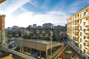 a view from the balcony of a building at Golden Pine, a private apartment in five star hotel in Zlatibor