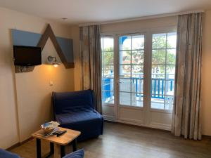 Μια τηλεόραση ή/και κέντρο ψυχαγωγίας στο Appartement Belle Dune