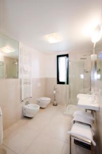 Salle de bains dans l'établissement Hotel Marco Polo