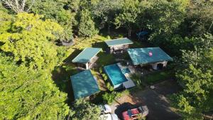 an overhead view of a house with a swimming pool at Eco Lung Hotel in Montezuma
