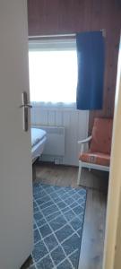 Postel nebo postele na pokoji v ubytování Chatky u potoka - chatička č.2