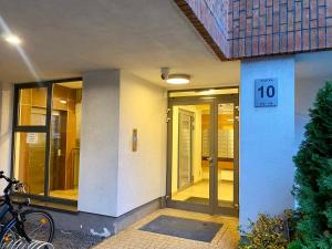a building with a door with the number on it at Project Comfort Apartament Dywizjonu 303 139/192 Warszawa in Warsaw