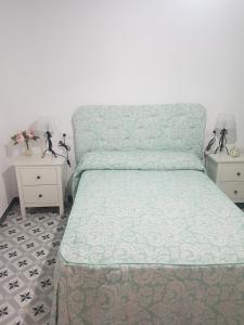 Una cama o camas en una habitación de CASA DRAGO
