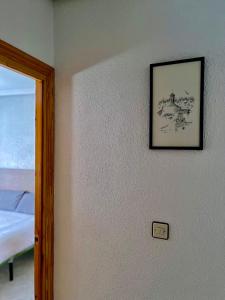 Postel nebo postele na pokoji v ubytování Piso con encanto