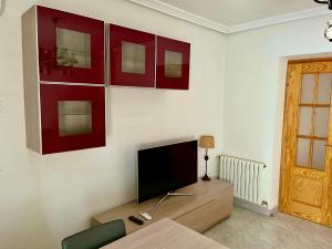 TV a/nebo společenská místnost v ubytování Piso con encanto