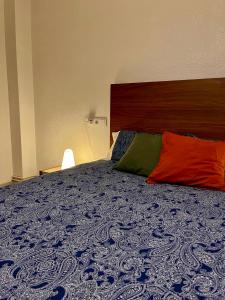 Postel nebo postele na pokoji v ubytování Piso con encanto