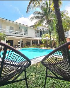 A piscina localizada em Pousada Toca da Praia ou nos arredores